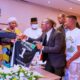Super Eagles hopeful presents jersey to Buhari in Portugal