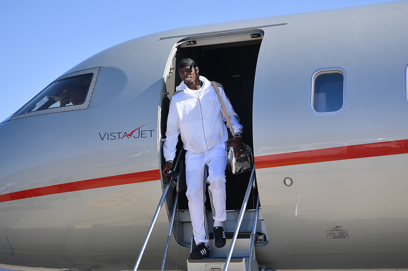 Paul Pogba arrives in Turin and is greeted by adoring Juventus fans