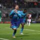 Arsenal Shines in San Siro Triumph, Iwobi Watches from the Bench