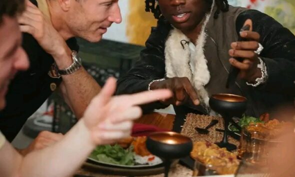 Rema joins Barcelona stars for dinner and photo session in America