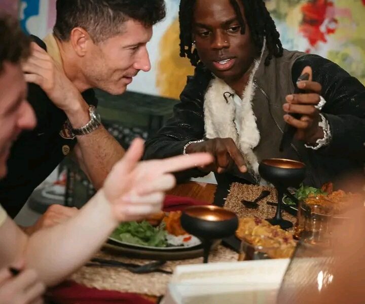 Rema joins Barcelona stars for dinner and photo session in America