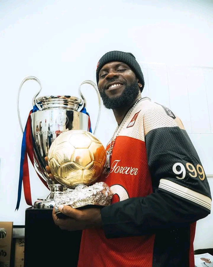 Odumodublvck Visits Spotify Camp Nou, Poses With Lionel Messi’s Prestigious Awards