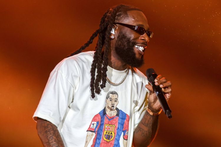 Burna Boy names Jay-Jay Okocha over Ronaldo and Messi as his football GOAT