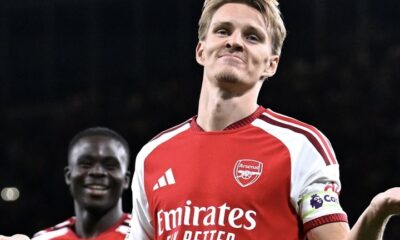 Arsenal begin title defence with emphatic win over Coventry