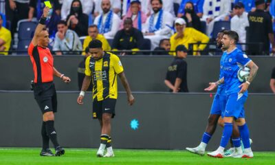 Al Hilal v Al Ittihad ends in chaos as players confront referee